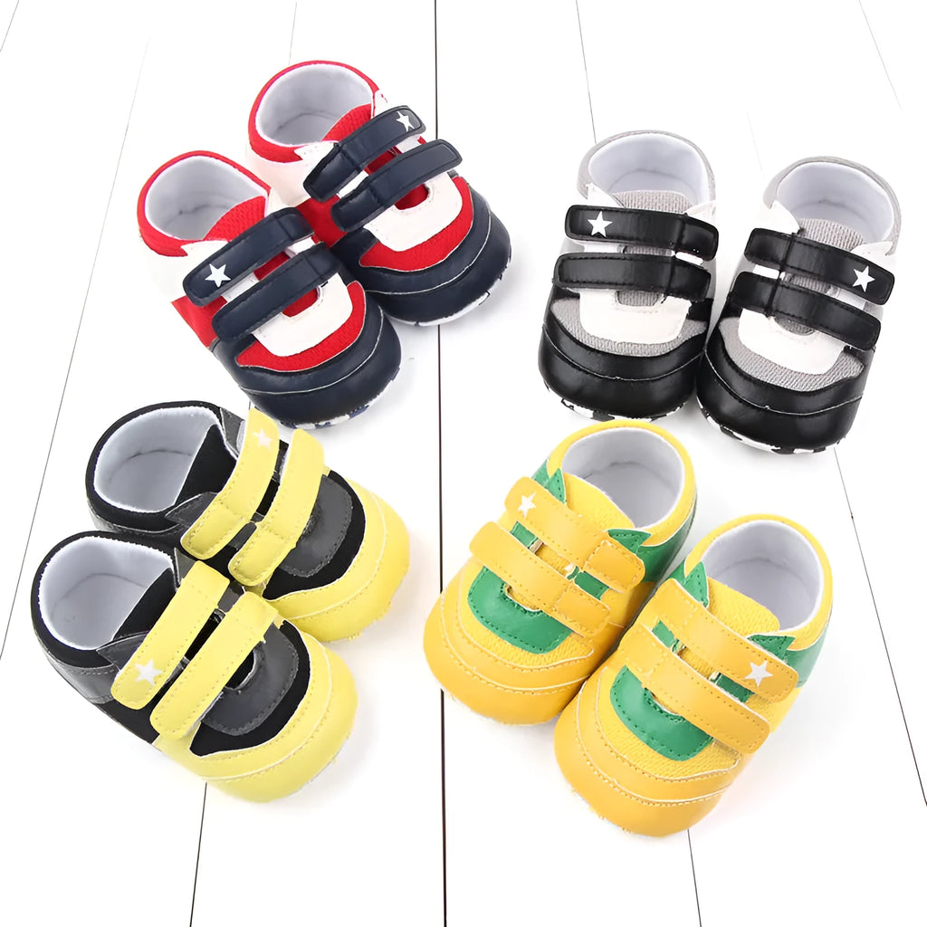 Toddler boy breathable mesh soft-soled sneakers in red and black with non-slip sole on a light background