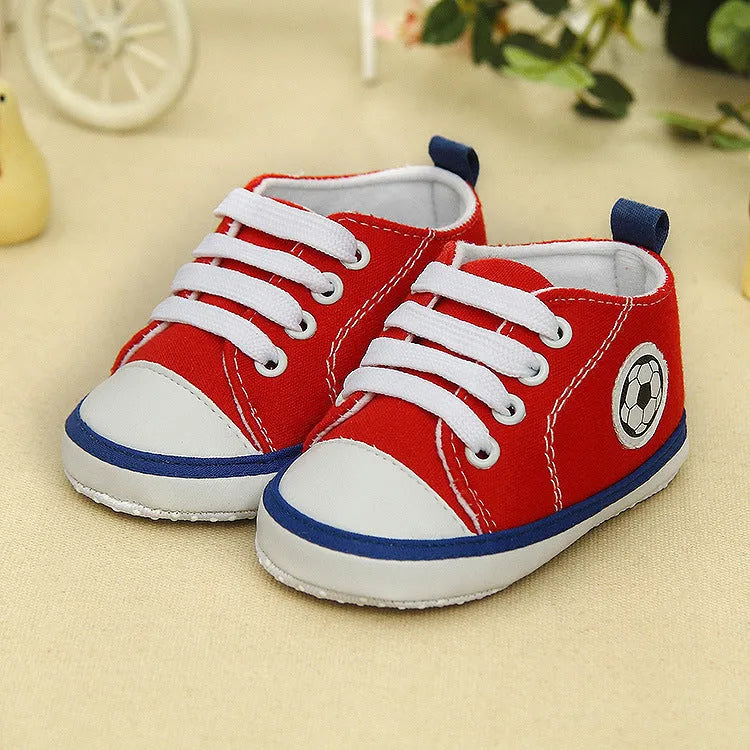 Baby canvas shoes in football blue with non-slip sole and striped pattern