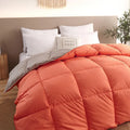 Goose down winter duvet with twill weave fabric in multiple colour options on a bed.