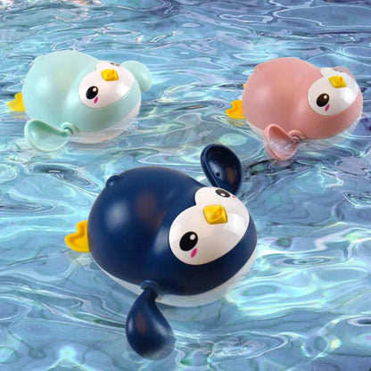 Adorable wind-up penguin bath toy with kawaii design, floating and swimming capabilities, and Montessori-inspired educational features