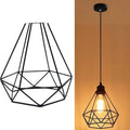 Black iron Nordic retro style chandelier with a modern simple design hanging from a ceiling