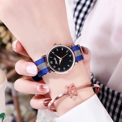 Luminous Starry Sky Watch with rainbow canvas strap and stainless steel clasp