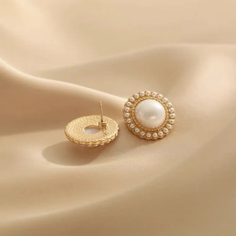 Elegant pearl inlaid alloy earrings in gold, perfect for any occasion