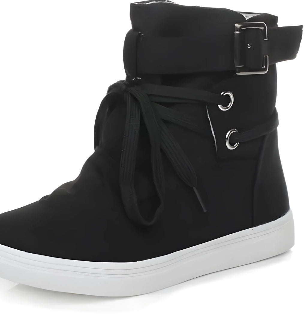Women's black canvas casual shoes with cross strap detail, flat heel, and lace-up closure on a plain background.