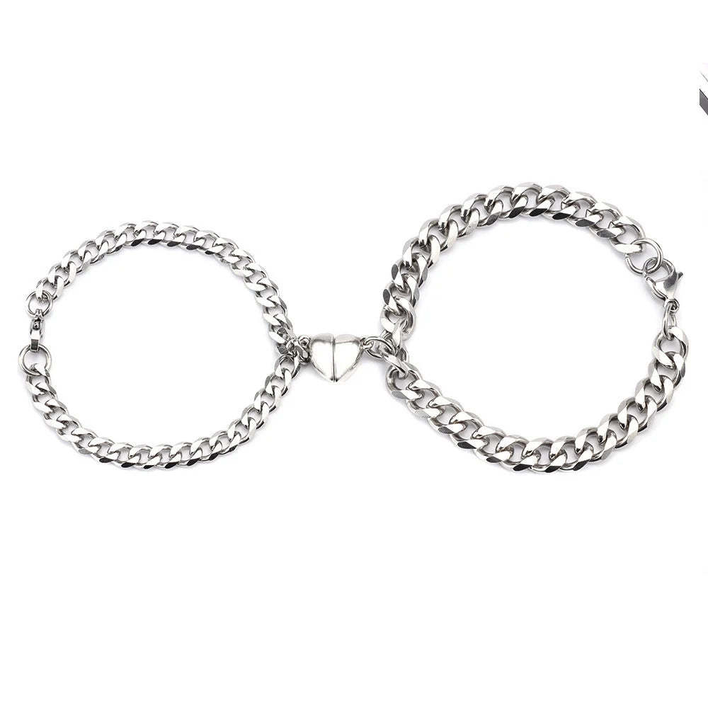 Titanium steel couple bracelets with heart-shaped charm in Cuban and NK chain styles