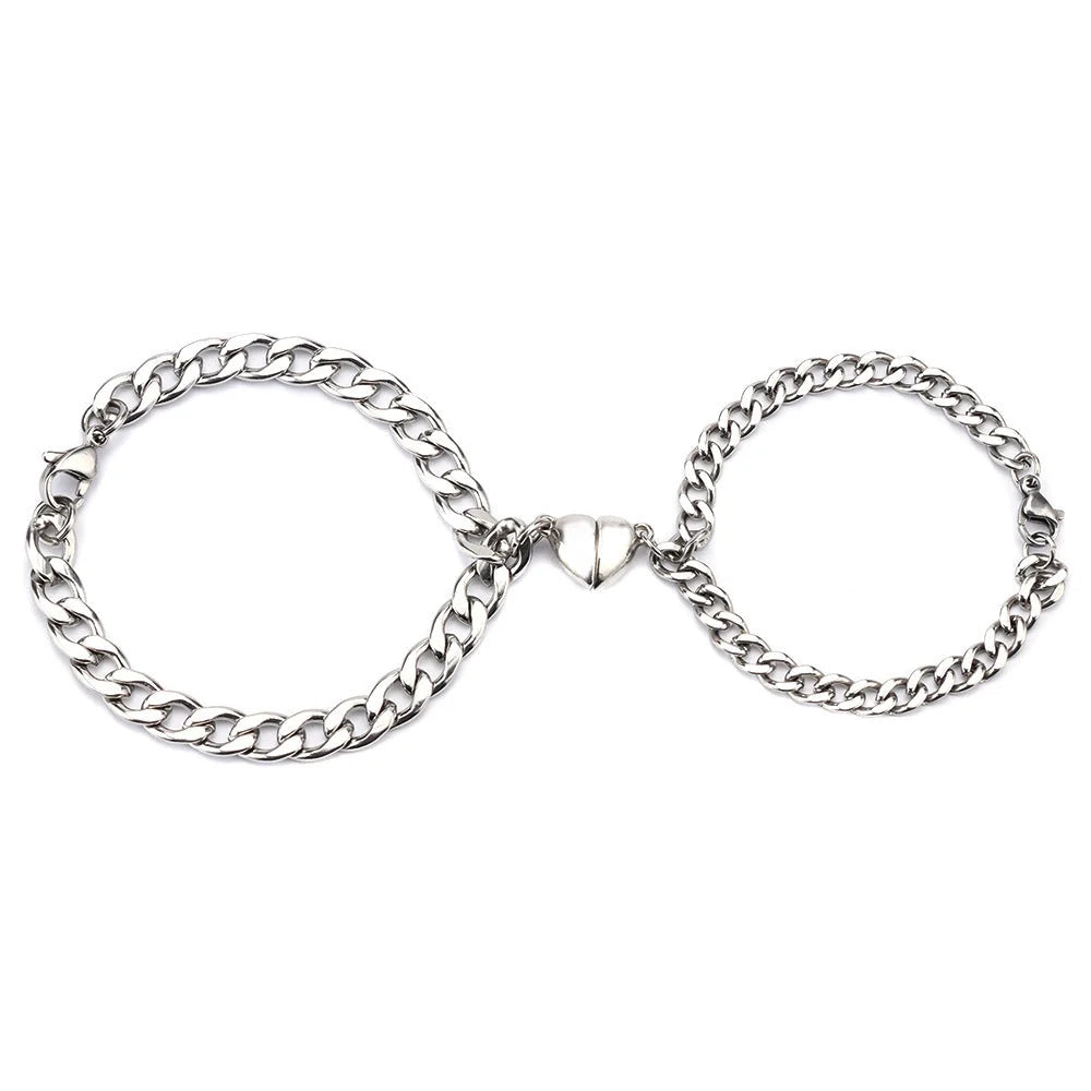 Titanium steel couple bracelets with heart-shaped charm in Cuban and NK chain styles