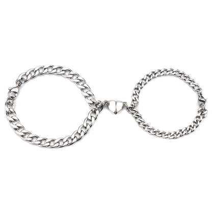 Titanium steel couple bracelets with heart-shaped charm in Cuban and NK chain styles