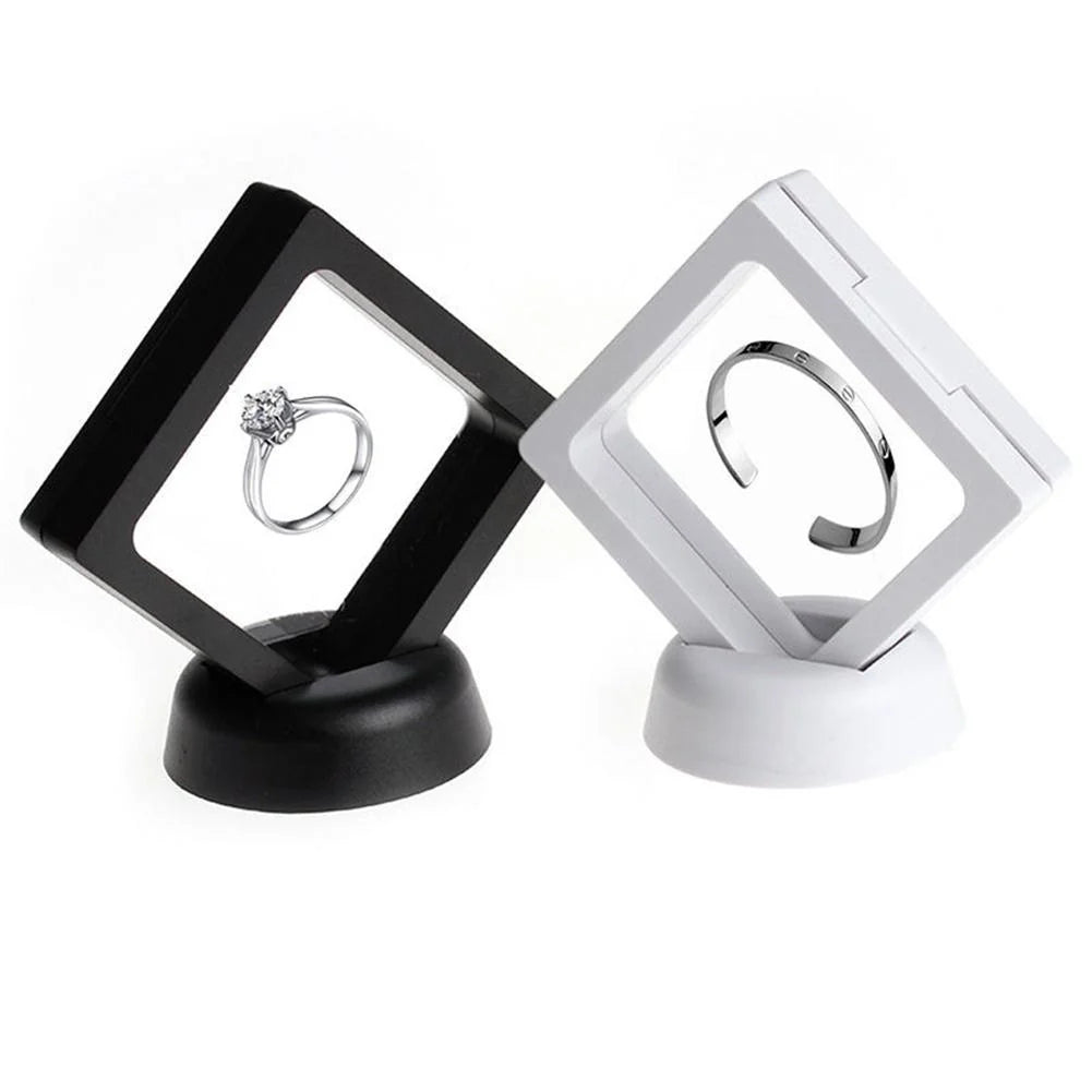 3D floating jewelry display stand showcasing earrings and coins in mid-air