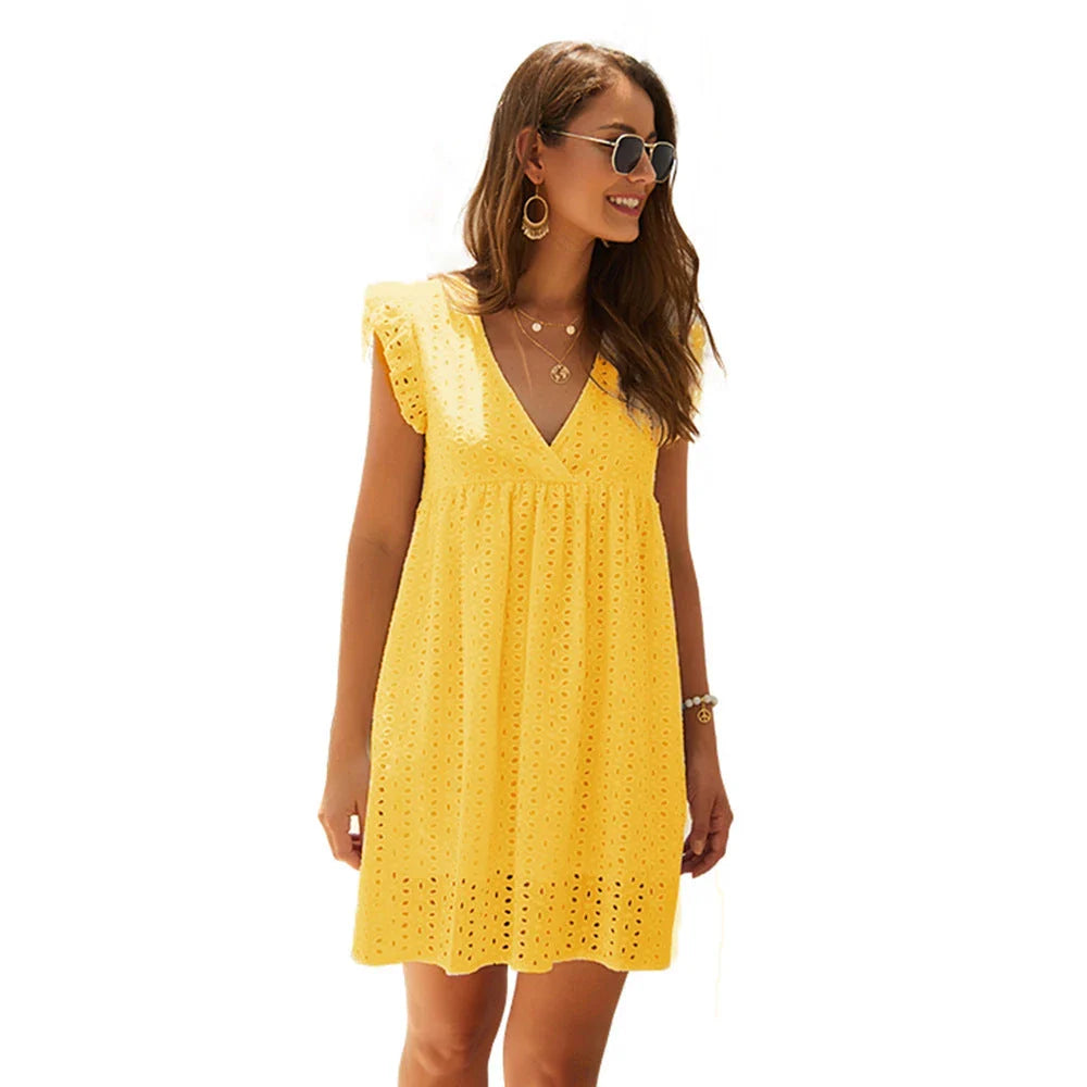 A stylish V-neck cotton dress with a flowy knee-length skirt, available in a variety of vibrant colors.