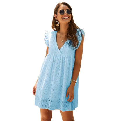 A stylish V-neck cotton dress with a flowy knee-length skirt, available in a variety of vibrant colors.