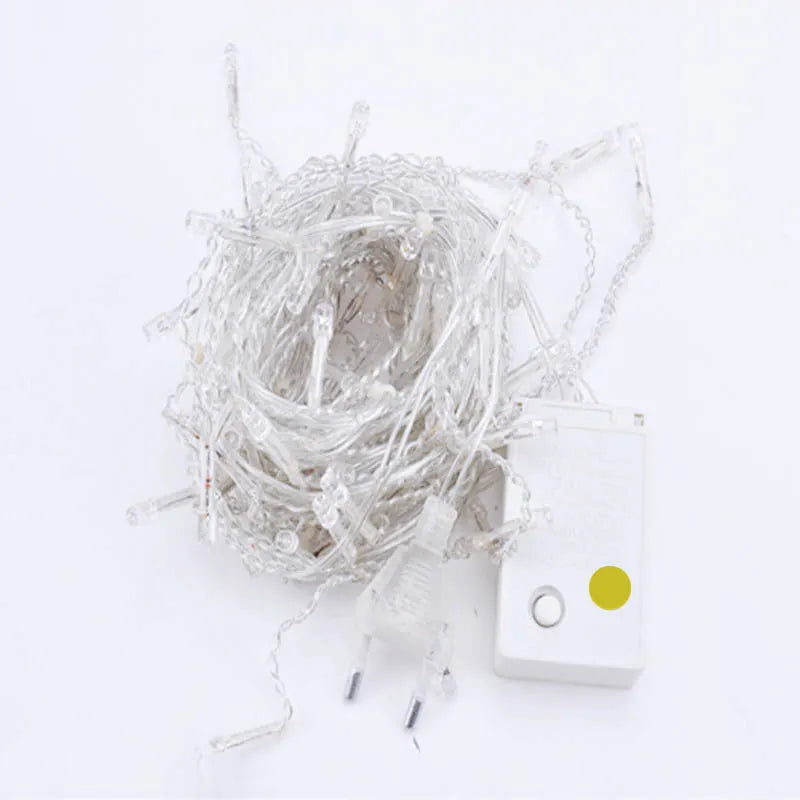 LED starry icicle light string with 96 lights on a 4-metre wire, showing three lengths of icicle drops in warm white illumination