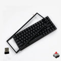 White 84-key mechanical keyboard with RGB backlighting on a wood desk, showcasing its compact layout and USB-C cable.