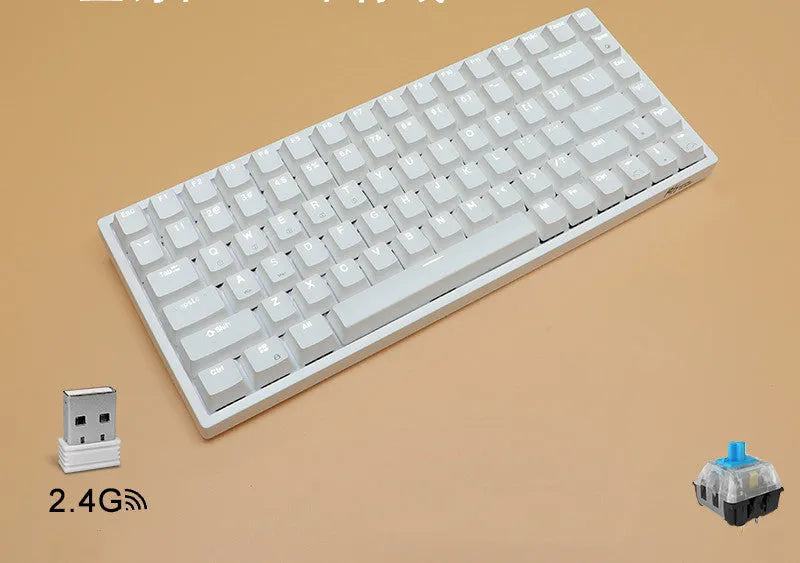 White 84-key mechanical keyboard with RGB backlighting on a wood desk, showcasing its compact layout and USB-C cable.