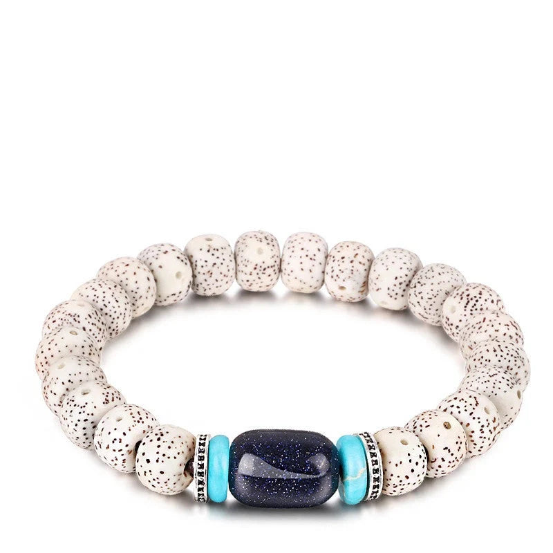 Bodhi Seed Root Bracelet with unique star, sun, moon, and cloud patterns