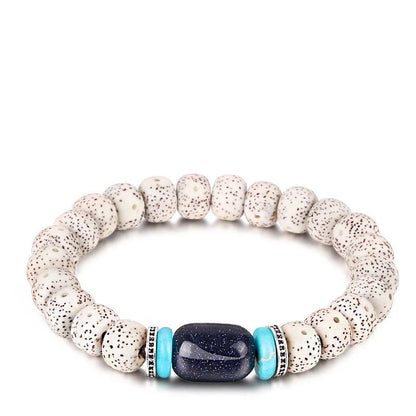 Bodhi Seed Root Bracelet with unique star, sun, moon, and cloud patterns