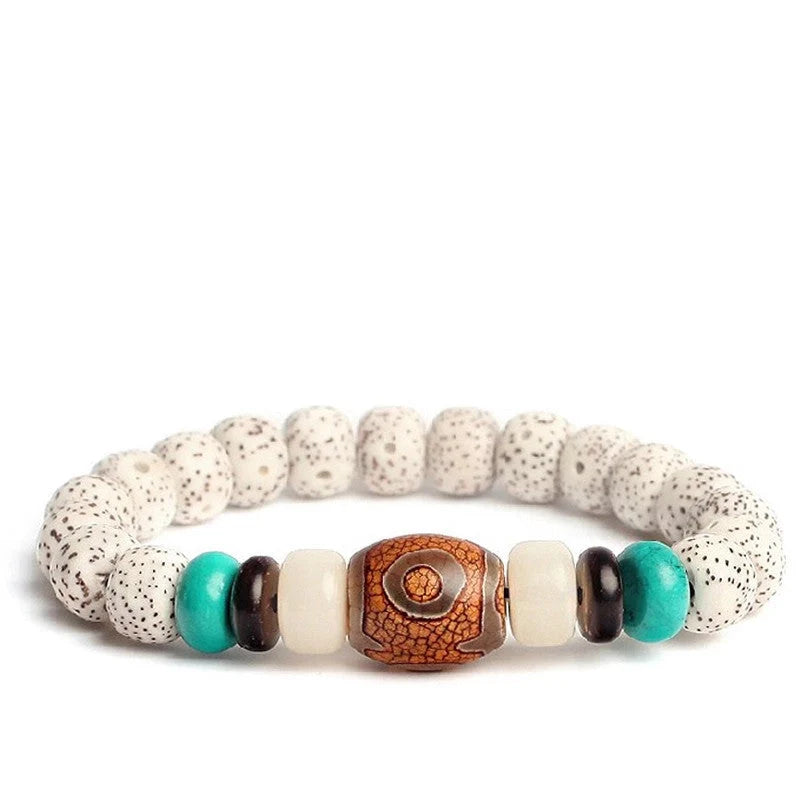 Bodhi Seed Root Bracelet with unique star, sun, moon, and cloud patterns