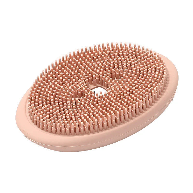 Versatile silicone soap holder with attached cleaning brush, available in a range of Kiwi-inspired Nordic colours and shapes