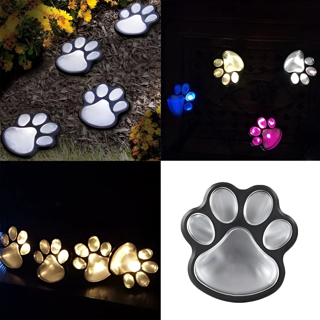 Black solar powered animal paw print LED garden lights set of four with central solar panel