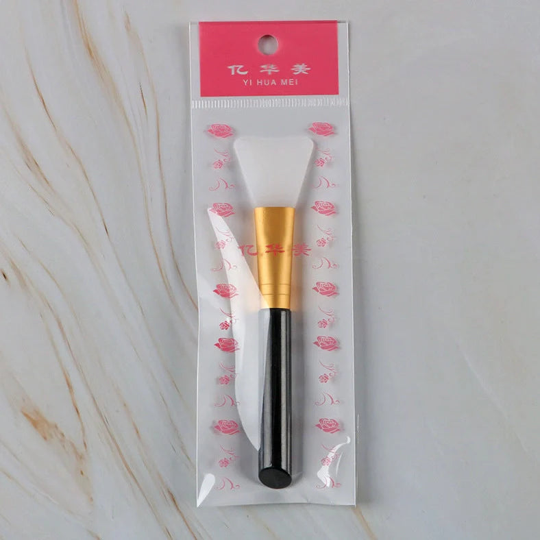 Silicone facial mask brush with 0.5cm bristles and 15cm handle in navy blue colour