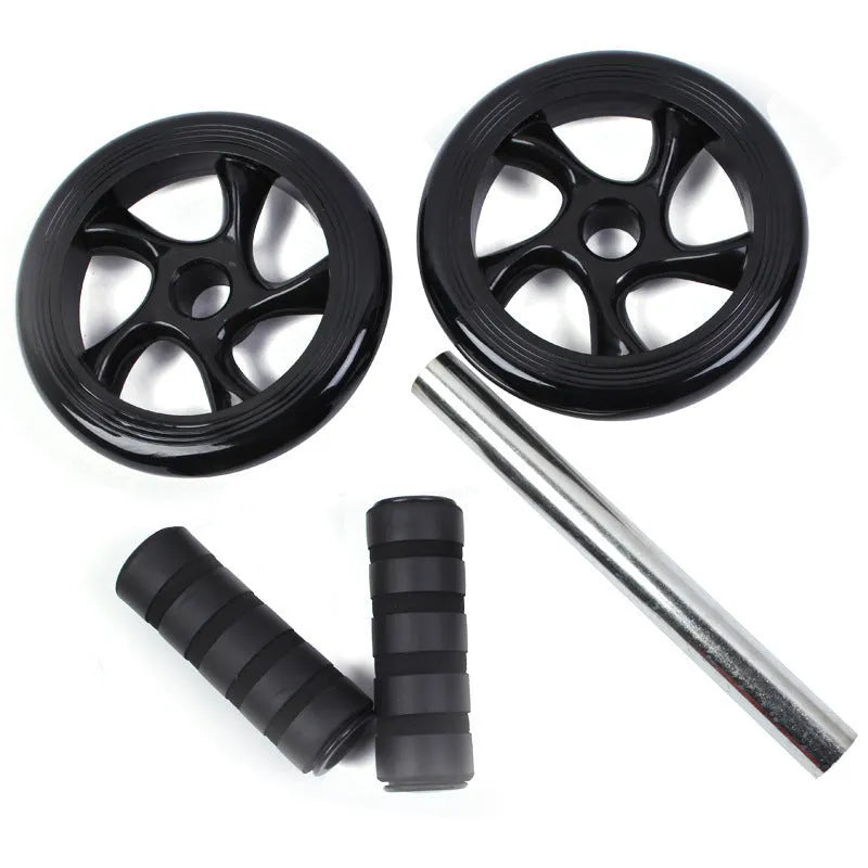 Silent abdominal muscle wheel in black, 165mm size, with kneeling pad on wooden floor