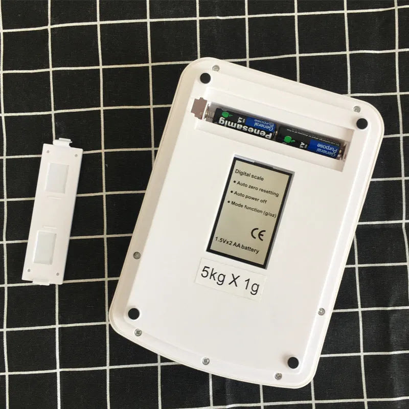 SF-400A electronic digital kitchen scale with 10kg maximum capacity on a kitchen worktop.