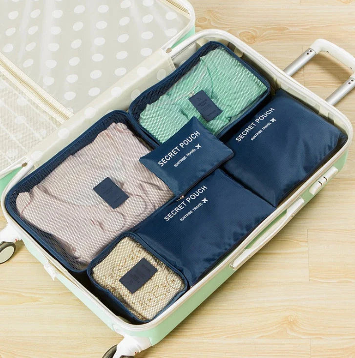 Durable waterproof packing cubes in various colors for organized, efficient travel