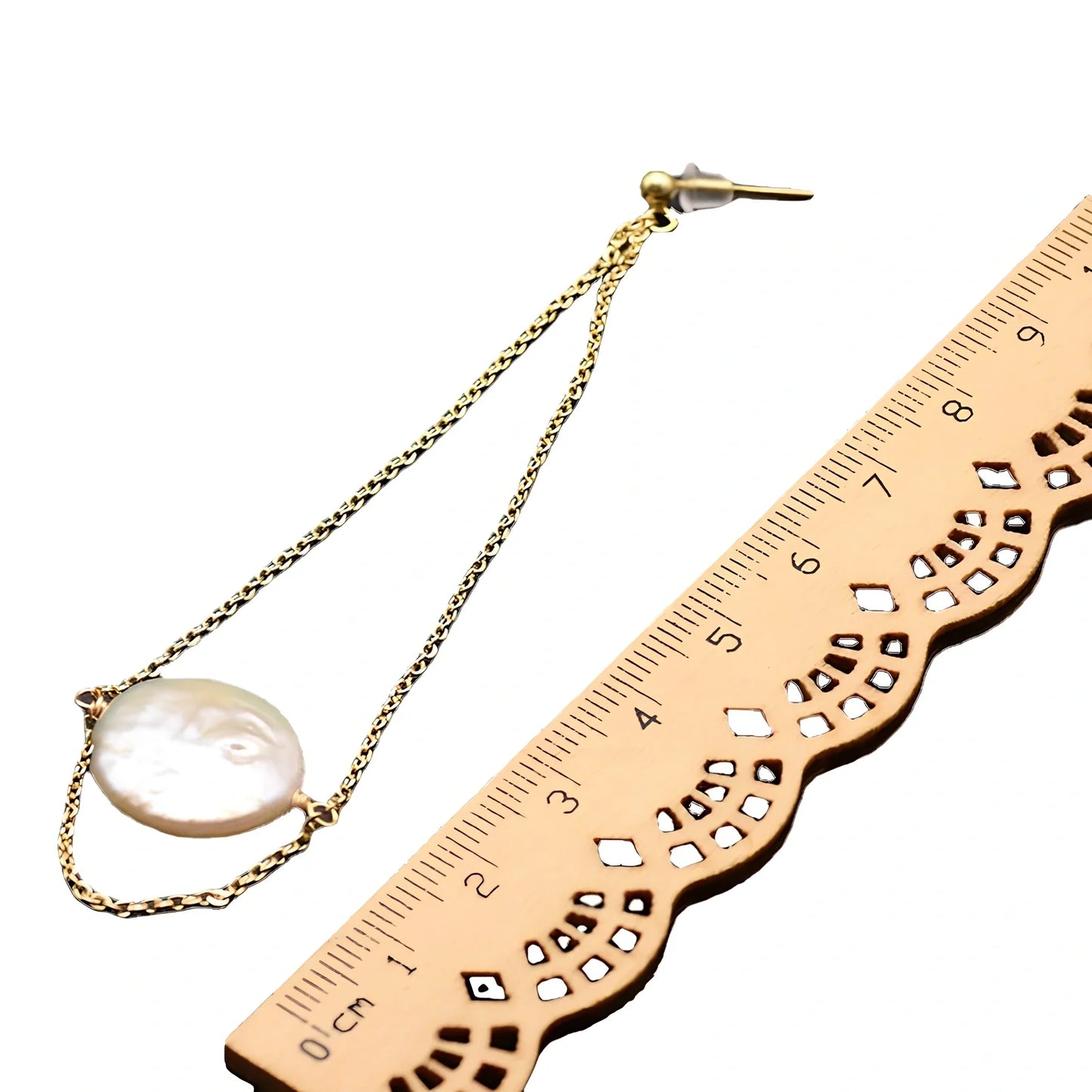 White baroque pearl stud earrings with natural surface and geometric shape measuring 8-10mm