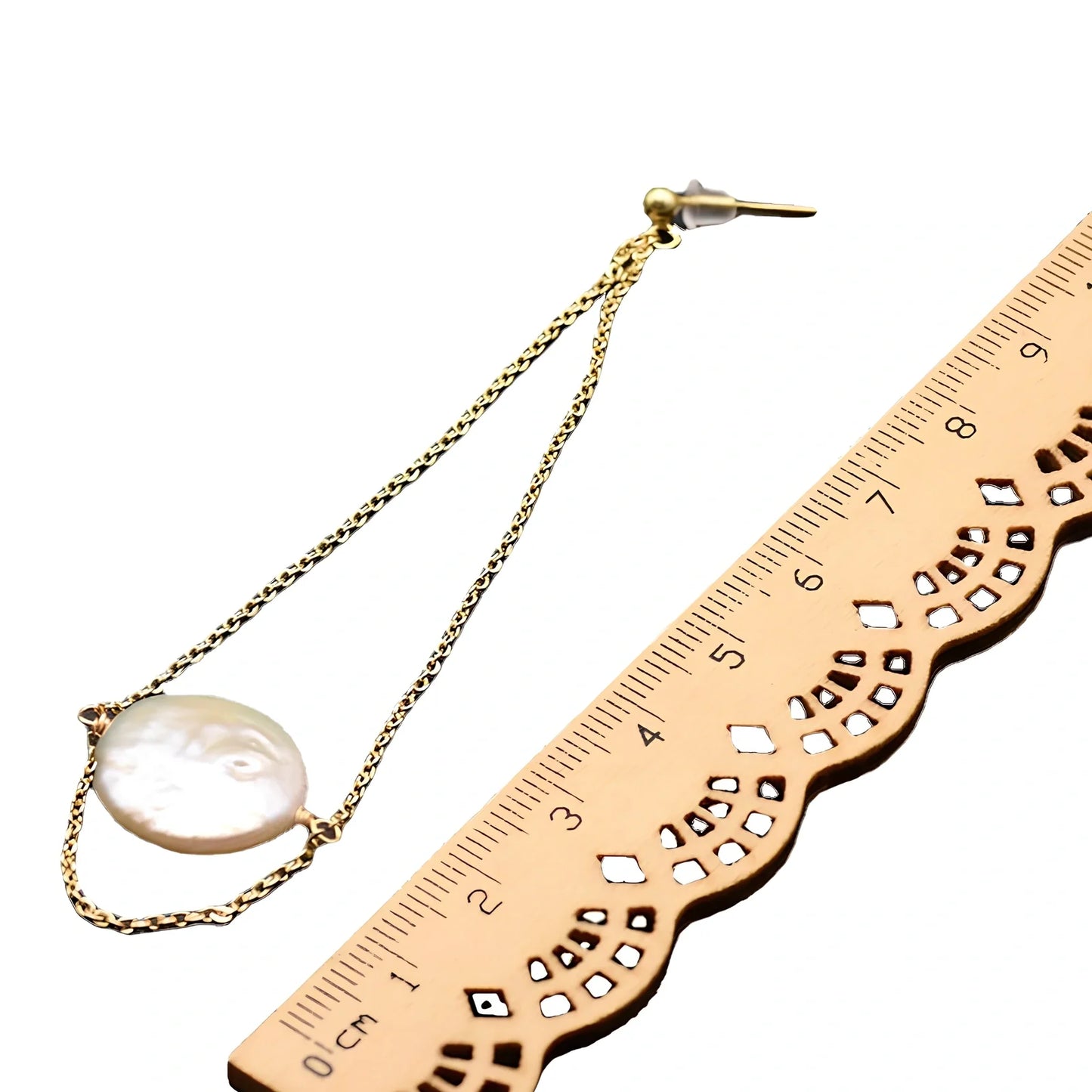 White baroque pearl stud earrings with natural surface and geometric shape measuring 8-10mm