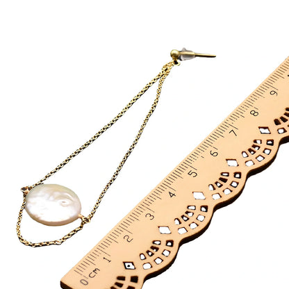 White baroque pearl stud earrings with natural surface and geometric shape measuring 8-10mm