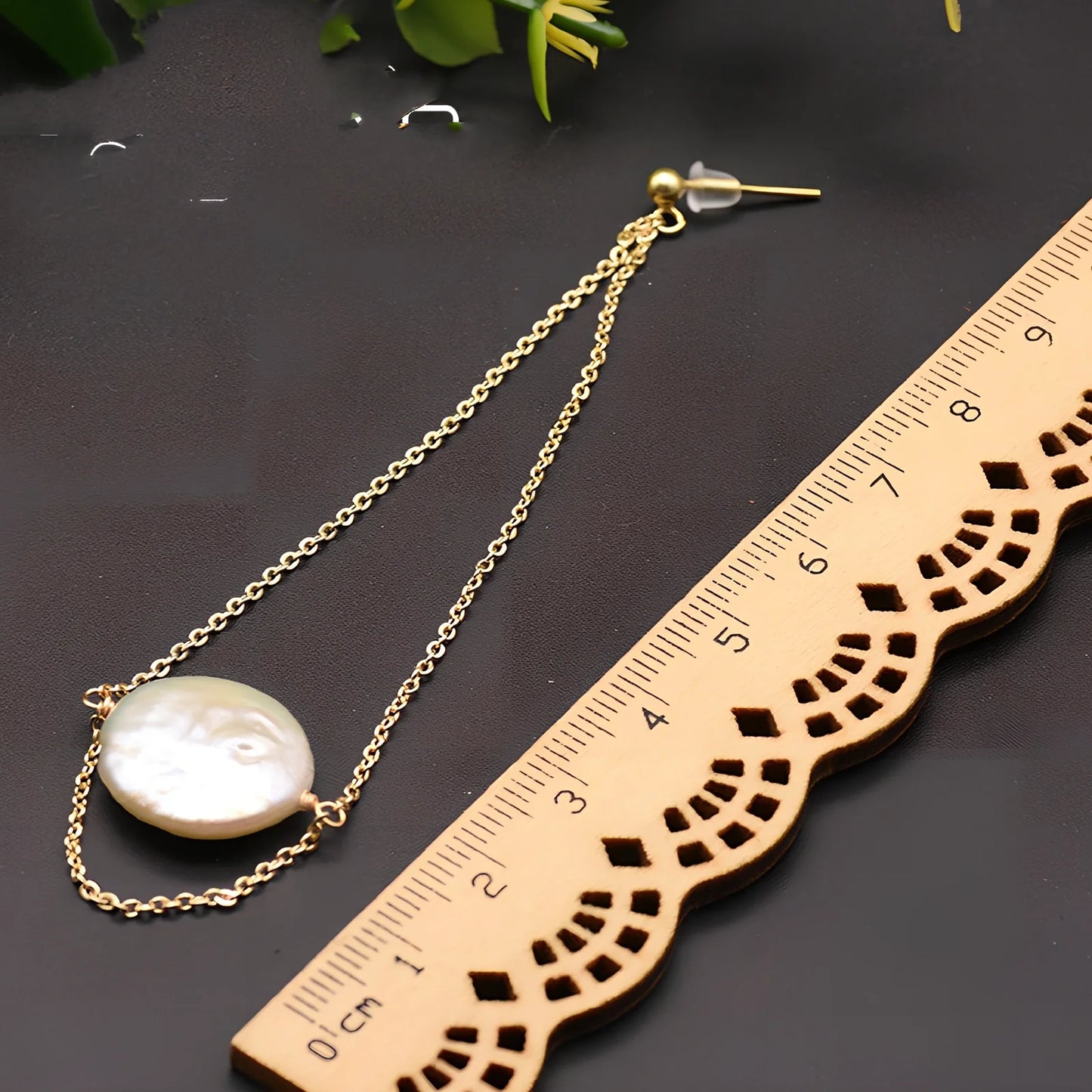 White baroque pearl stud earrings with natural surface and geometric shape measuring 8-10mm