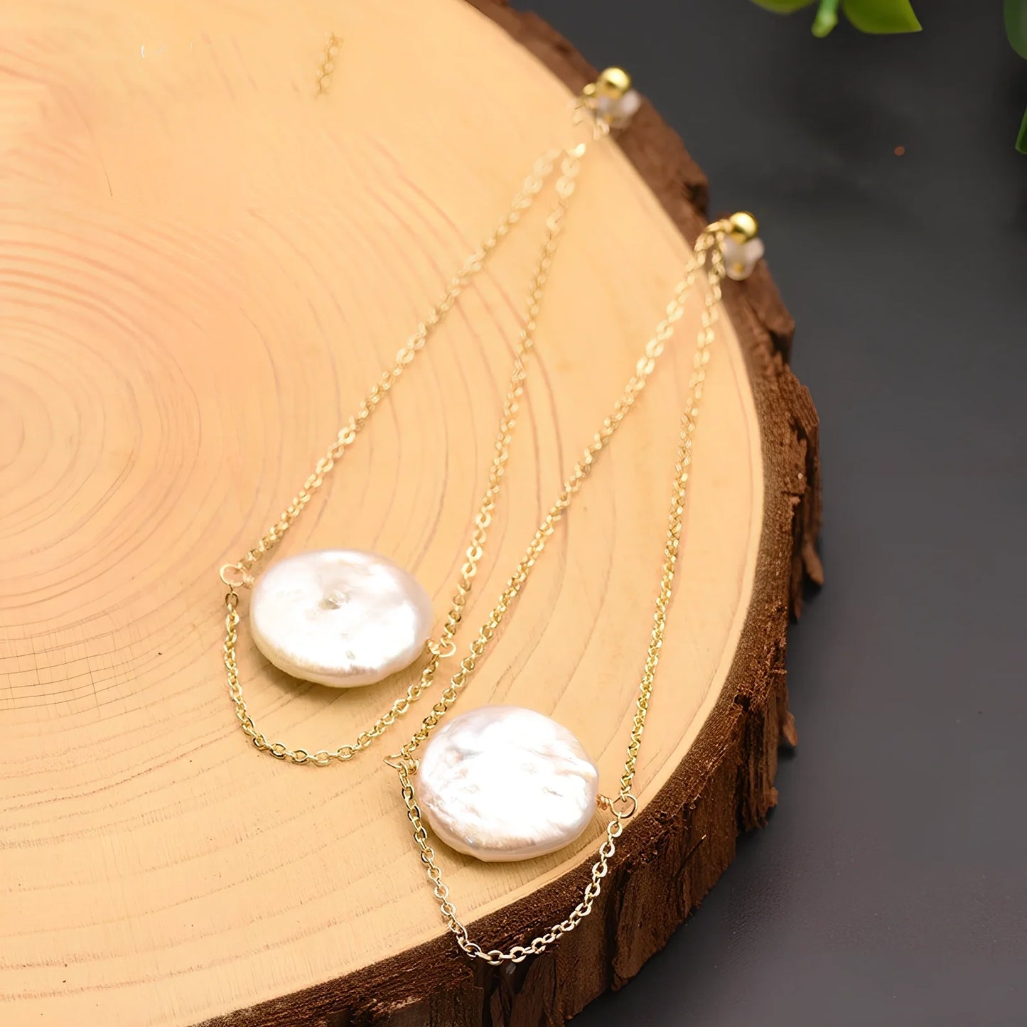 White baroque pearl stud earrings with natural surface and geometric shape measuring 8-10mm