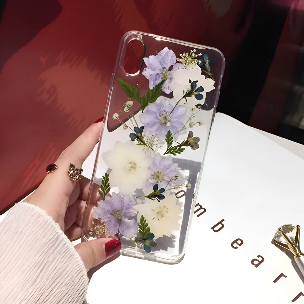 Soft TPU iPhone case with blue and purple dried flower basket design for multiple models.