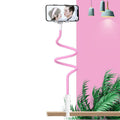 Blue universal mobile phone holder with bendable memory alloy hose mounted on a bedside table