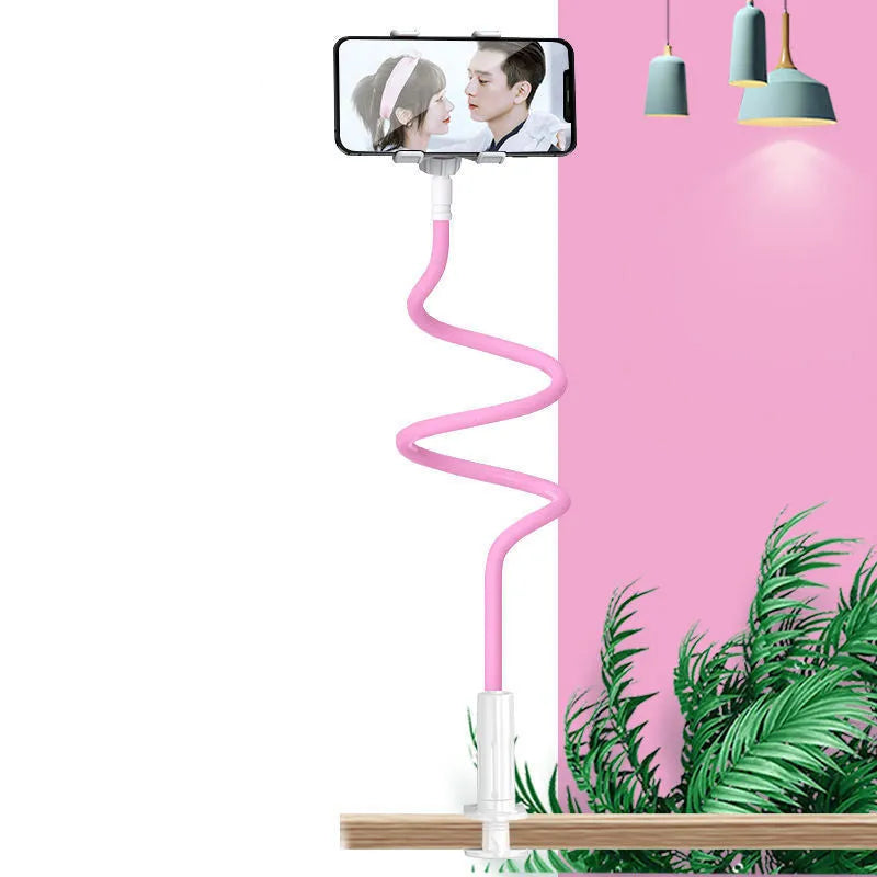 Blue universal mobile phone holder with bendable memory alloy hose mounted on a bedside table