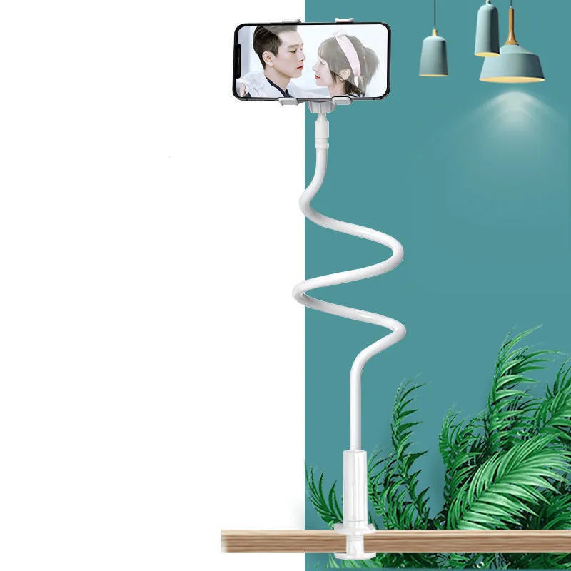 Blue universal mobile phone holder with bendable memory alloy hose mounted on a bedside table