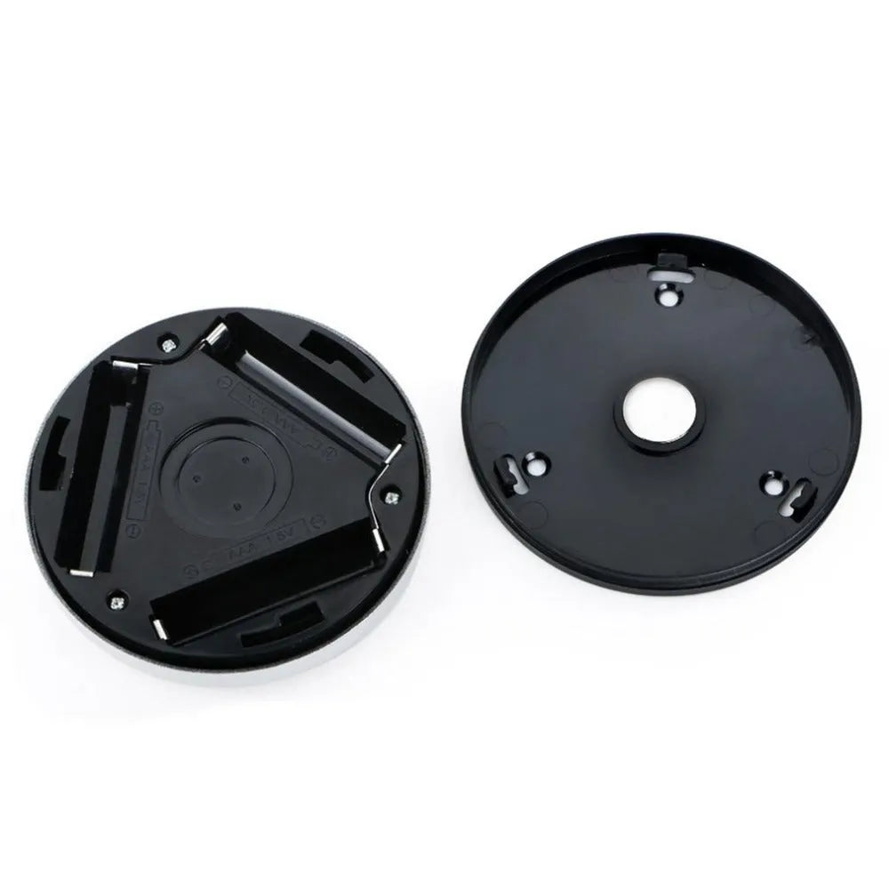 Silver or black wireless motion sensor night light with a square PC plastic lampshade.