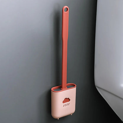 Wall-mounted silicone toilet brush tool in blue, grey, and pink with anti-adhesive coating