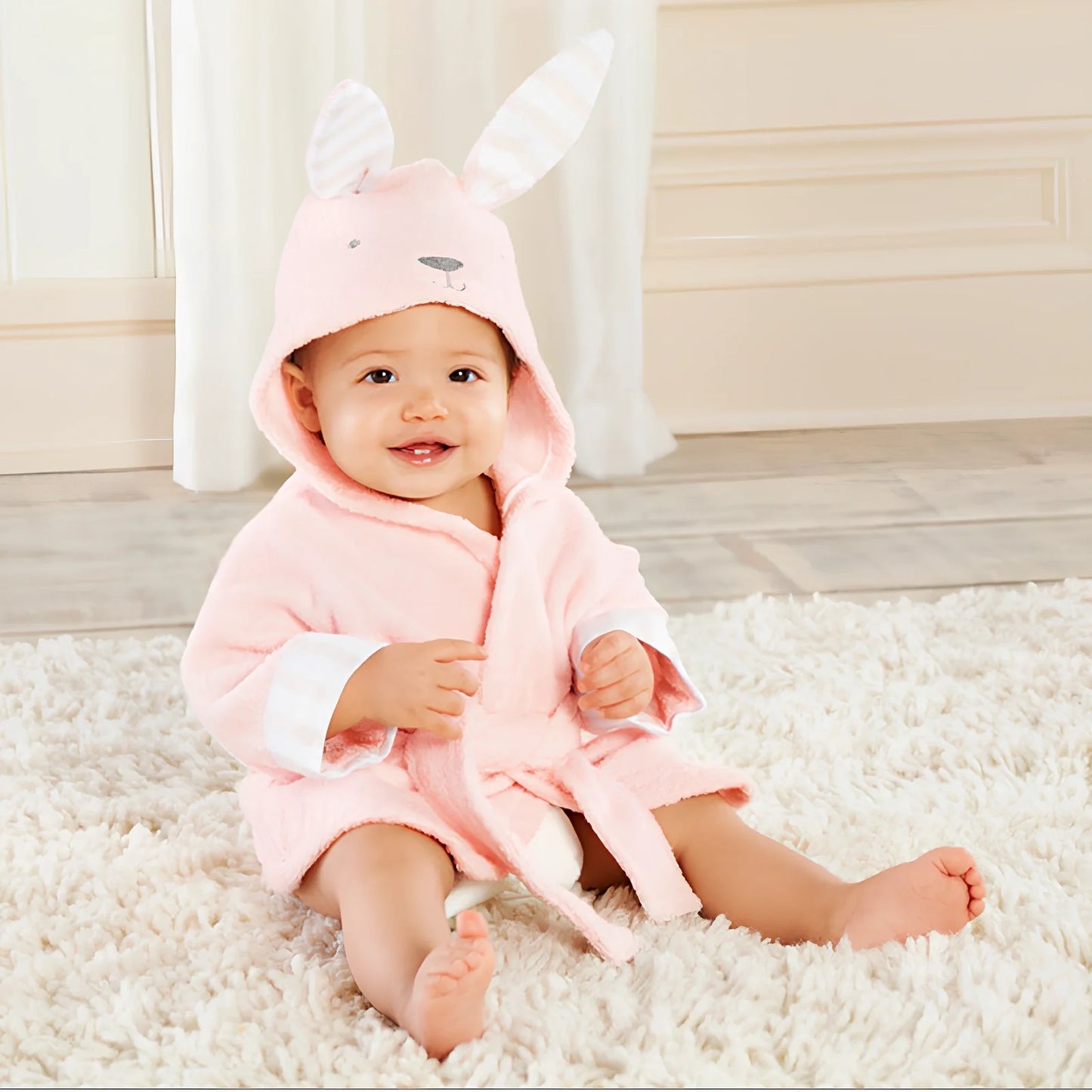 Cotton baby bathrobe with animal hood showing panda design, belt fastening, and absorbent fabric