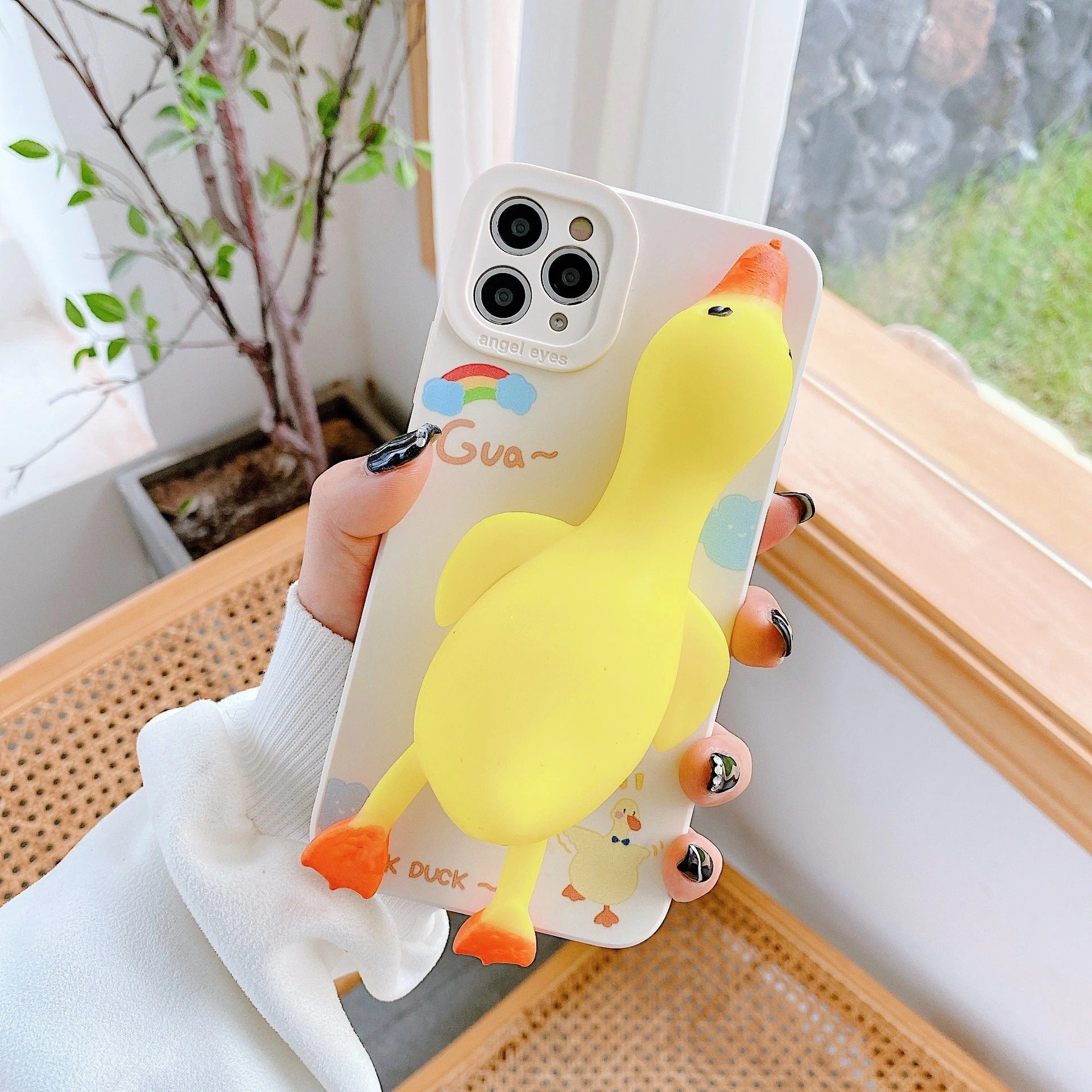 Stylish cartoon phone cases in vibrant colors to protect your Kiwi iPhone