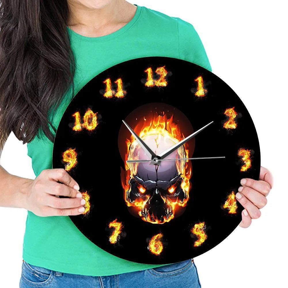 Burning skull wall clock with 30cm diameter, black PU shell, plastic dial, and 24-hour indication on a plain background