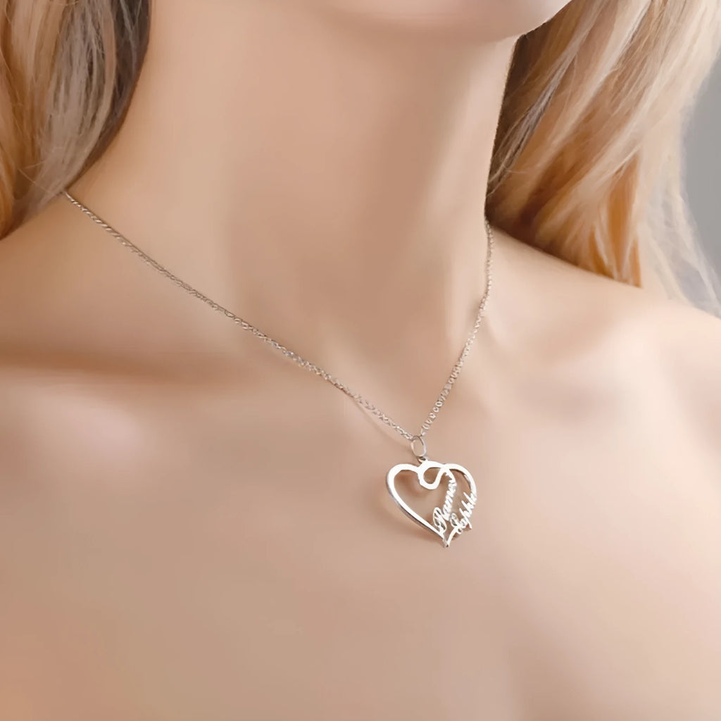 Double heart necklace with smooth textured pendant in gold finish on O-shaped chain