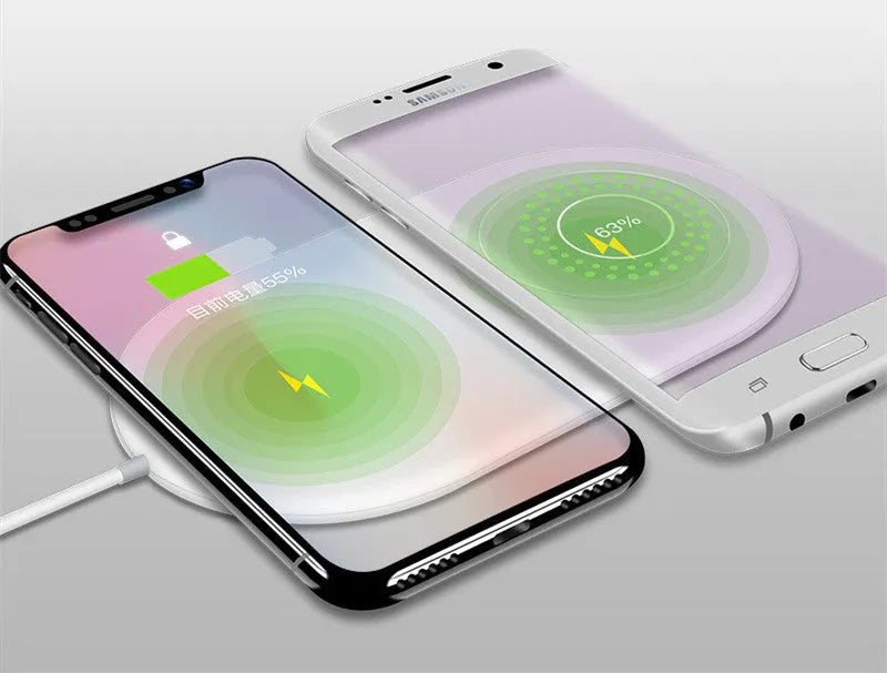 White dual wireless charging station for two mobile phones on a minimalist base.