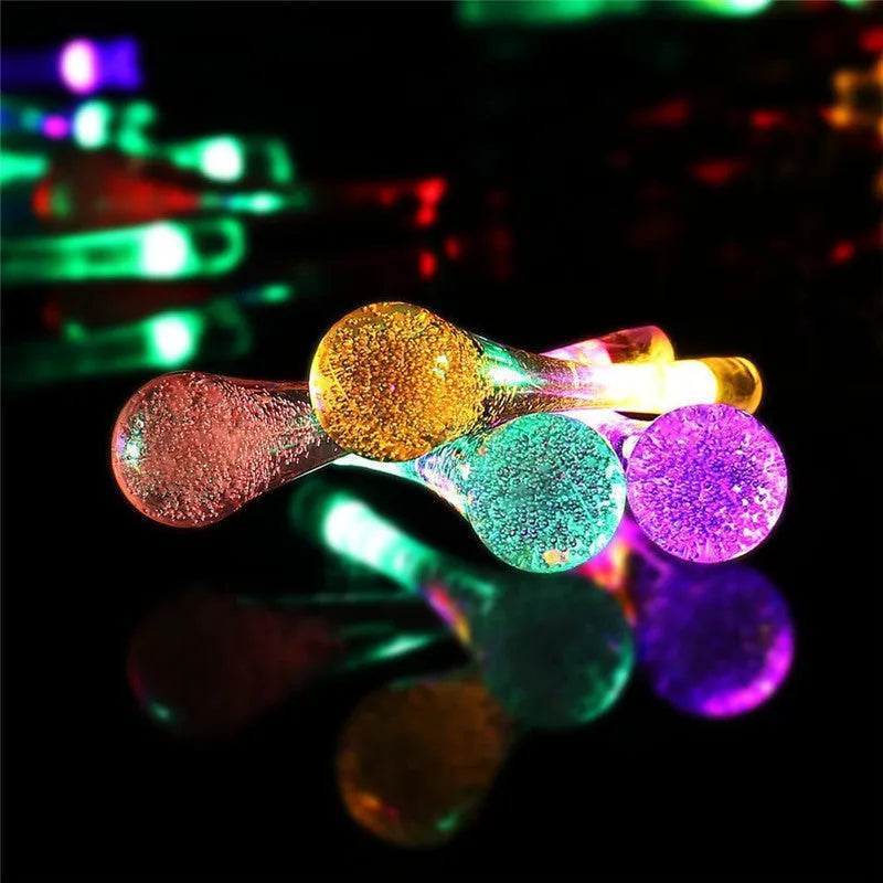 30 LED solar-powered outdoor string lights with bubble drops pendant design on 6.5 metre waterproof cable