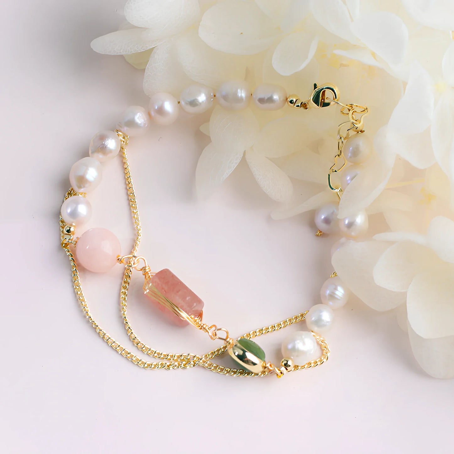 Women's geometric freshwater pearl bracelet with strawberry crystals and precise spacing