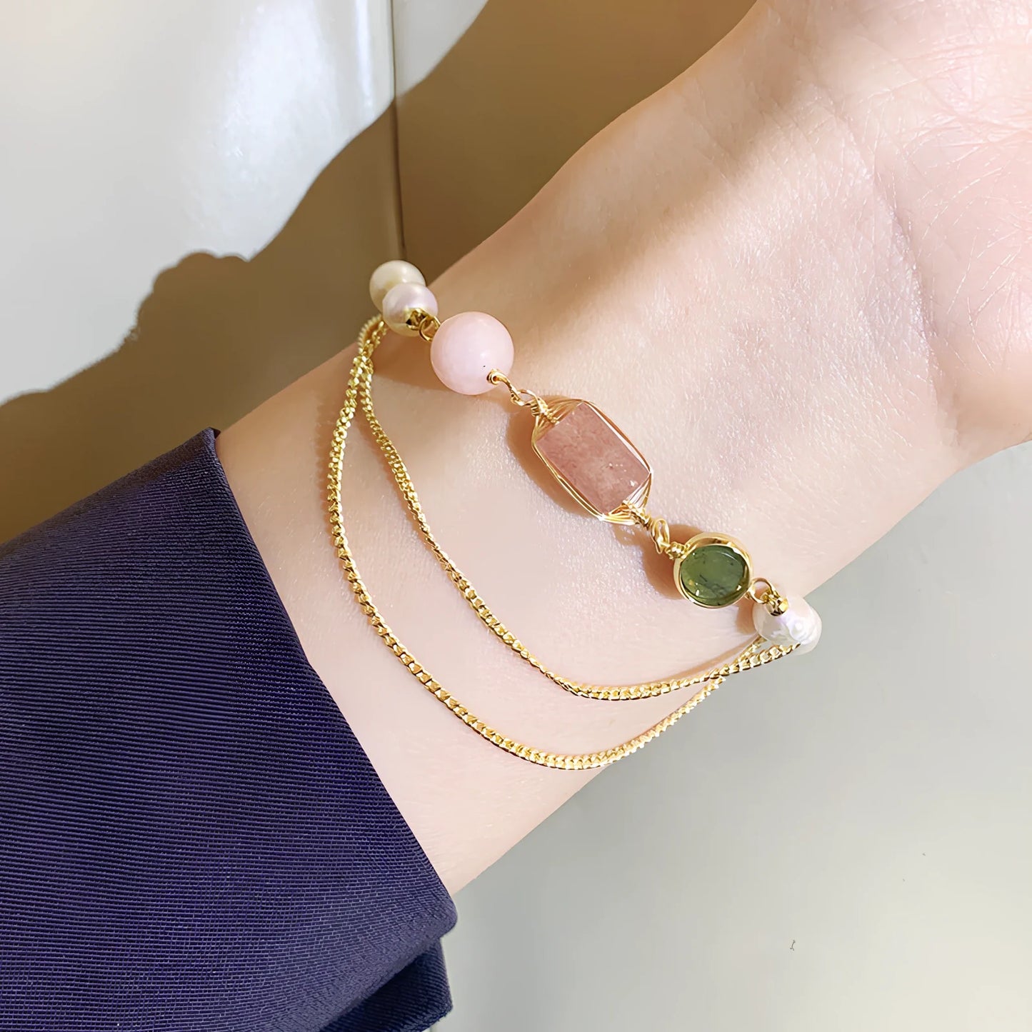 Women's geometric freshwater pearl bracelet with strawberry crystals and precise spacing