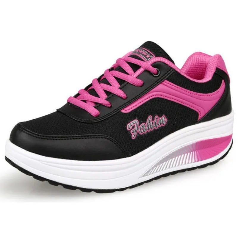 Women's single travel sports shoe in a choice of colours with a mid heel.