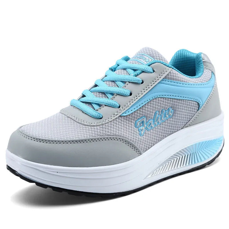 Women's single travel sports shoe in a choice of colours with a mid heel.