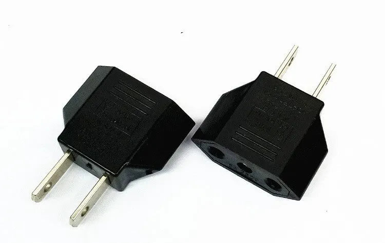 Universal travel power adapter with three sockets for AU, EU and US plug types