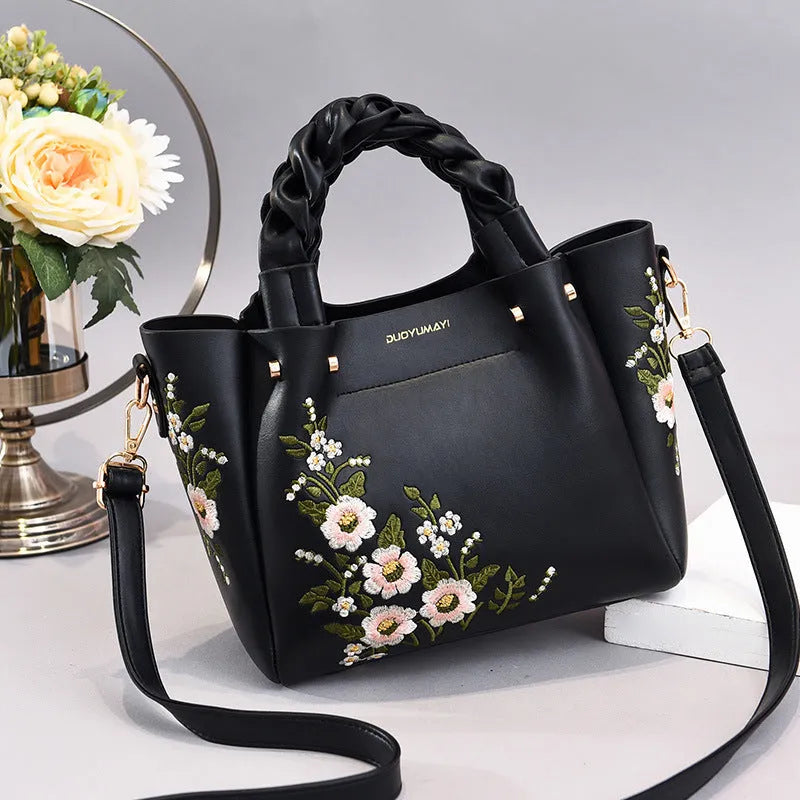 Medium PU leather drawstring tote bag for women in khaki, with shoulder strap and car stitching detail