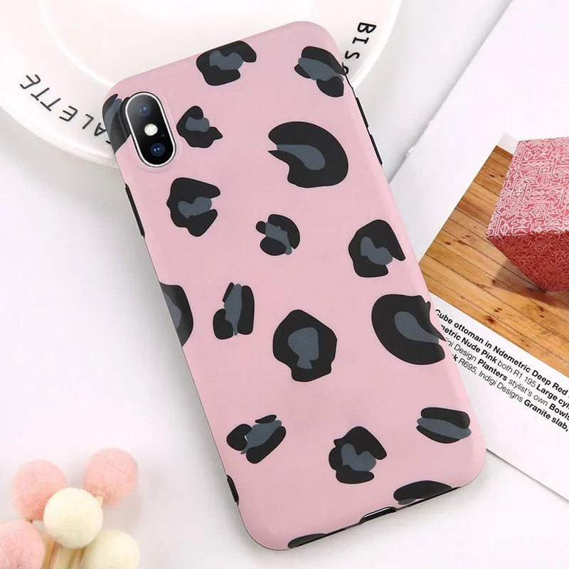 Leopard print iPhone phone case shown in black, blue, and pink colour options.